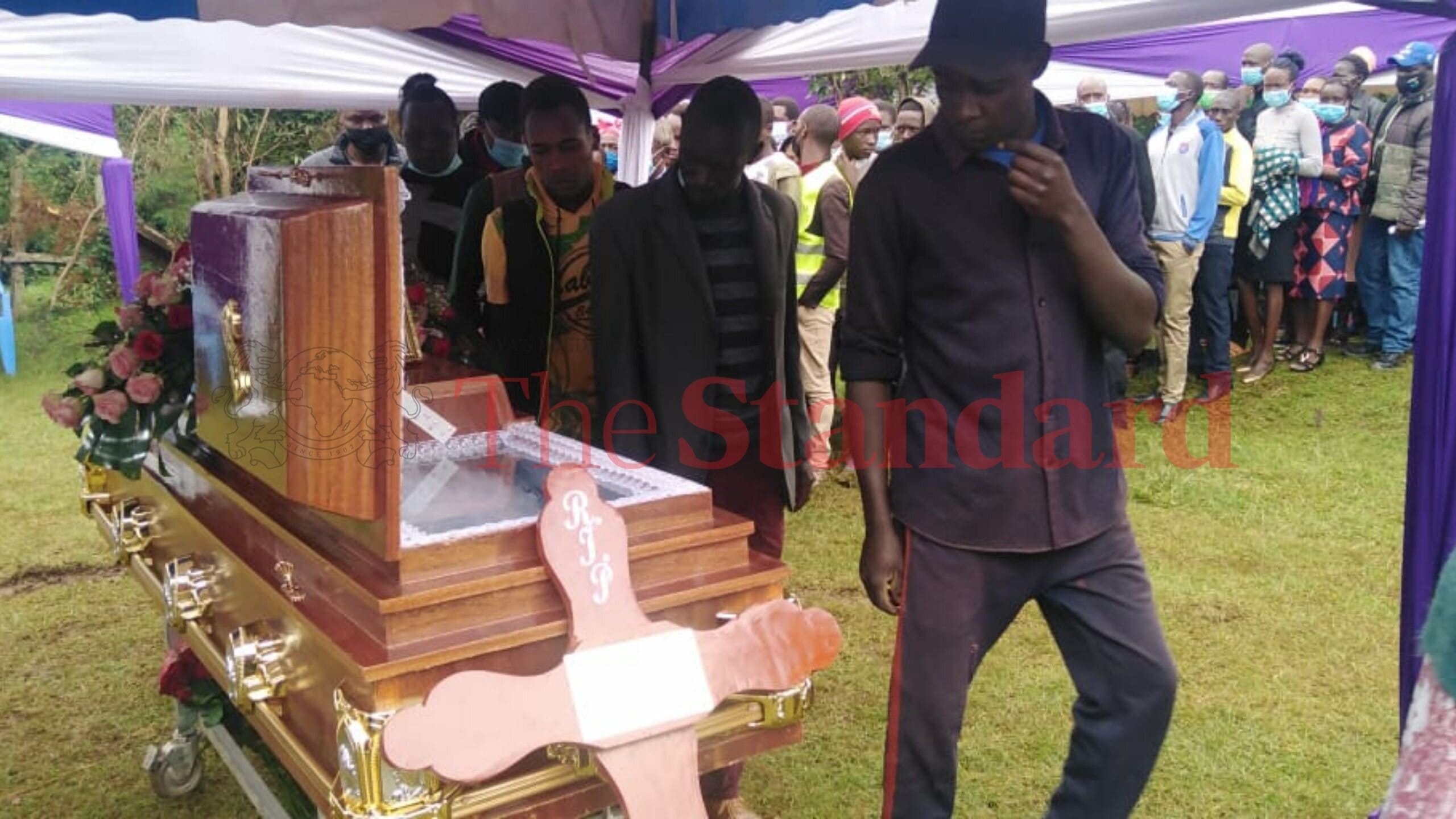 Mourners view the body of late Caroline Kangogo during her funeral on July 29th 2021